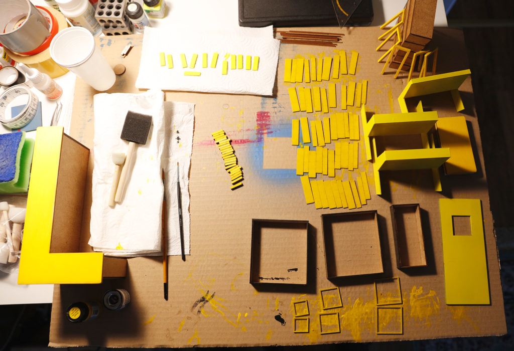 Behind the Scenes of Yellow Cube: Painting the Furniture